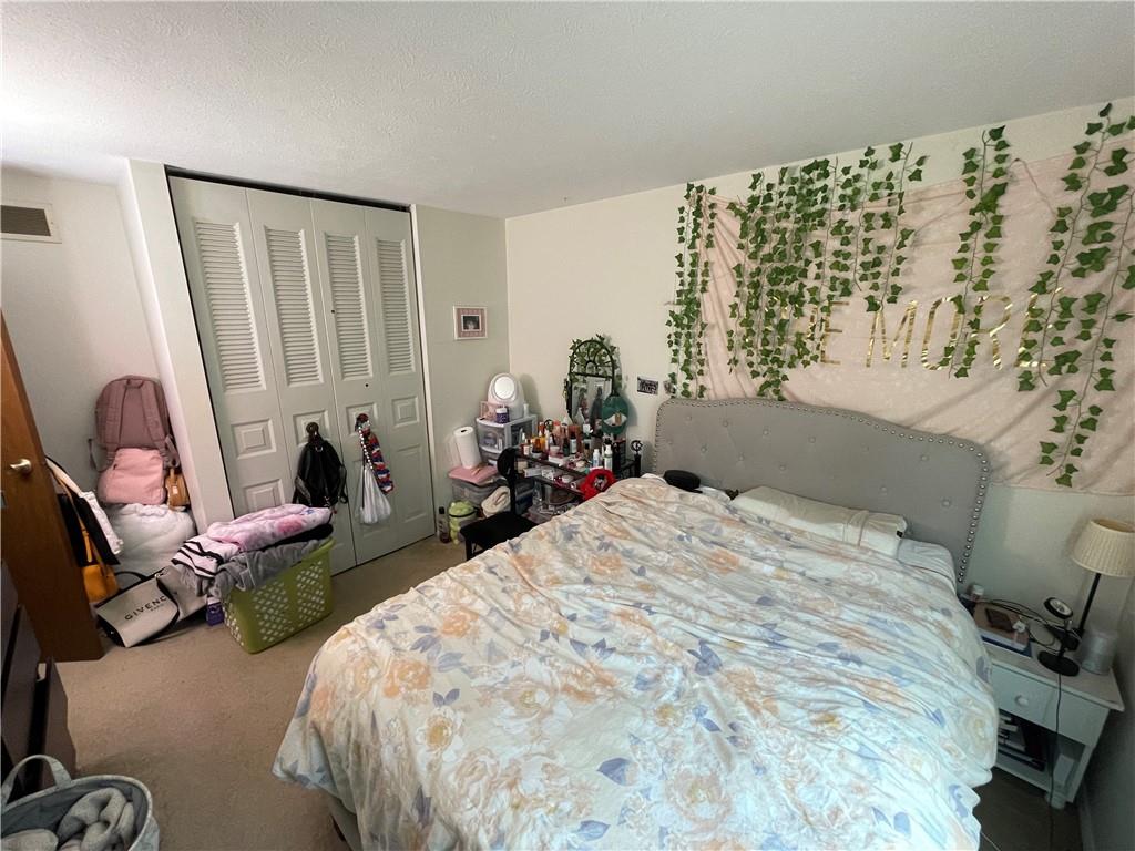 271 Quail Run Road Venetia, PA 15367 - Photo 20 of 30 a bed sitting in a bedroom next to a window