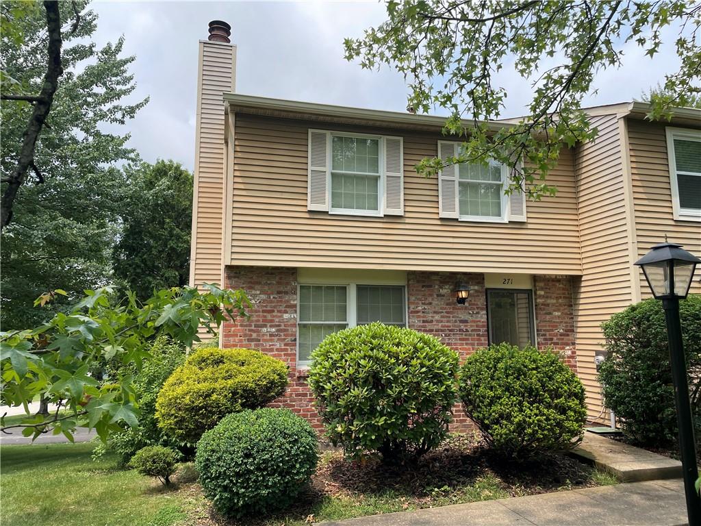 271 Quail Run Road Venetia, PA 15367 - Photo 2 of 30 a front view of a house with a yard