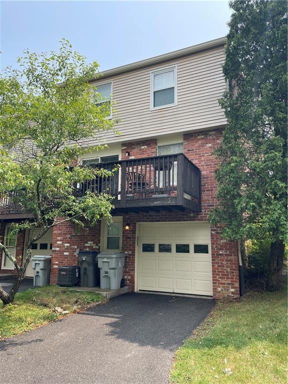 271 Quail Run Road Venetia, PA 15367 - Photo 30 of 30 a front view of a house with a garden and deck