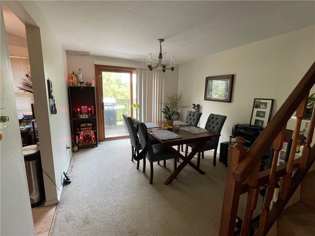 271 Quail Run Road Venetia, PA 15367 - Photo 6 of 30 a view of a dining room with furniture and a window