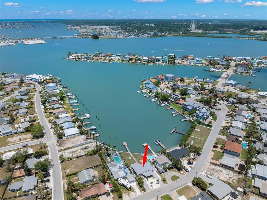 708 Sunset Cove Madeira Beach, FL 33708 - Photo 59 of 61 an aerial view of a house with outdoor space