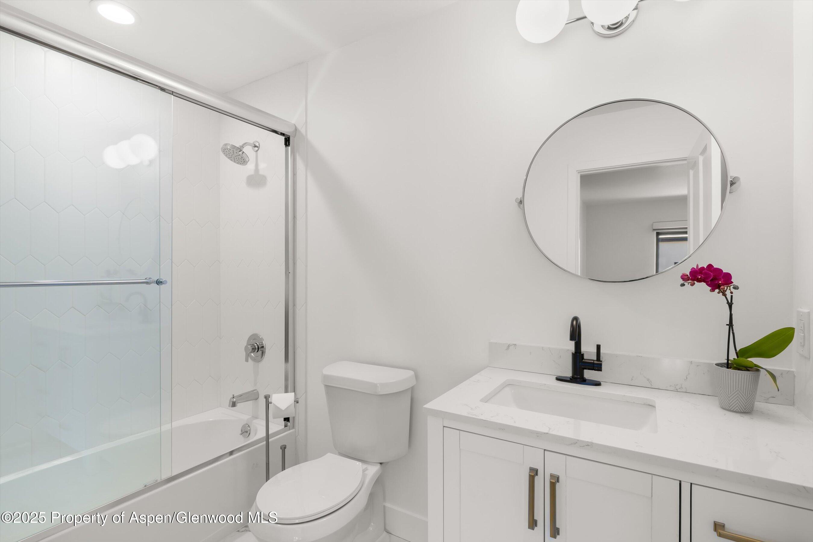 400 Meadow Lane Basalt, CO 81621 - Photo 19 of 28 a bathroom with a sink toilet and shower