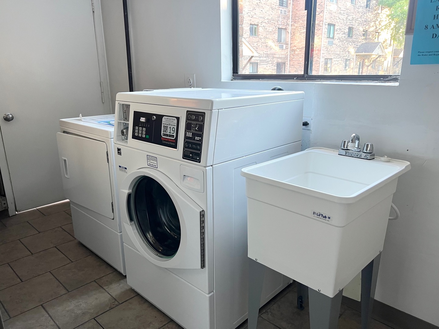 2219 Nichols Road, Unit 17A Arlington Heights, IL 60004 - Photo 15 of 19 a utility room with dryer and washer
