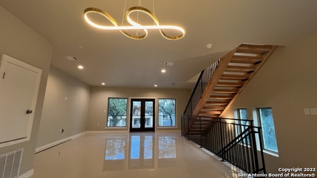 14751 Old Bandera Road, Unit 3202 Helotes, TX 78023 - Photo 1 of 1 a view of entryway and hall with wooden floor