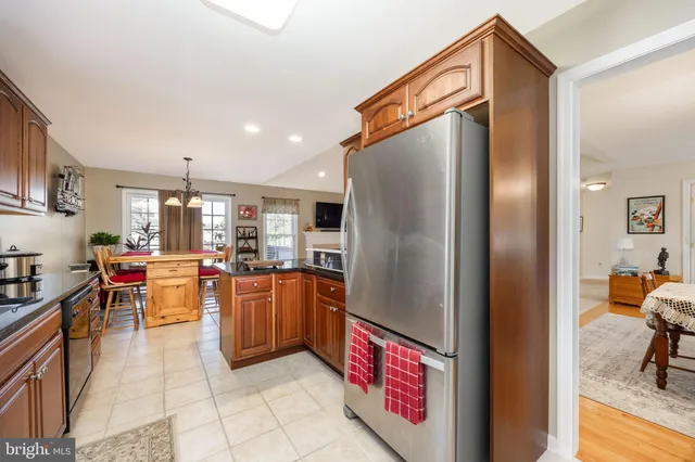 a view of a balcony with a floor to ceiling window and wooden floor