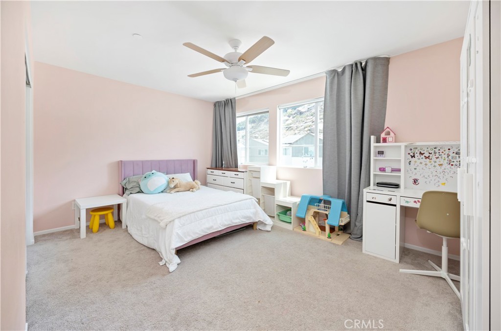 34758 Criollo Way Fallbrook, CA 92028 - Photo 15 of 25 a bedroom with a bed chair and window