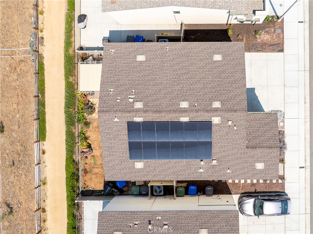 34758 Criollo Way Fallbrook, CA 92028 - Photo 21 of 25 a front view of a building with a yard