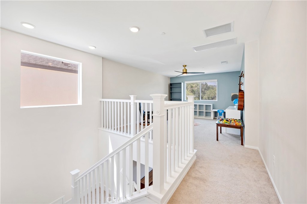 34758 Criollo Way Fallbrook, CA 92028 - Photo 9 of 25 a view of a hallway with seating area