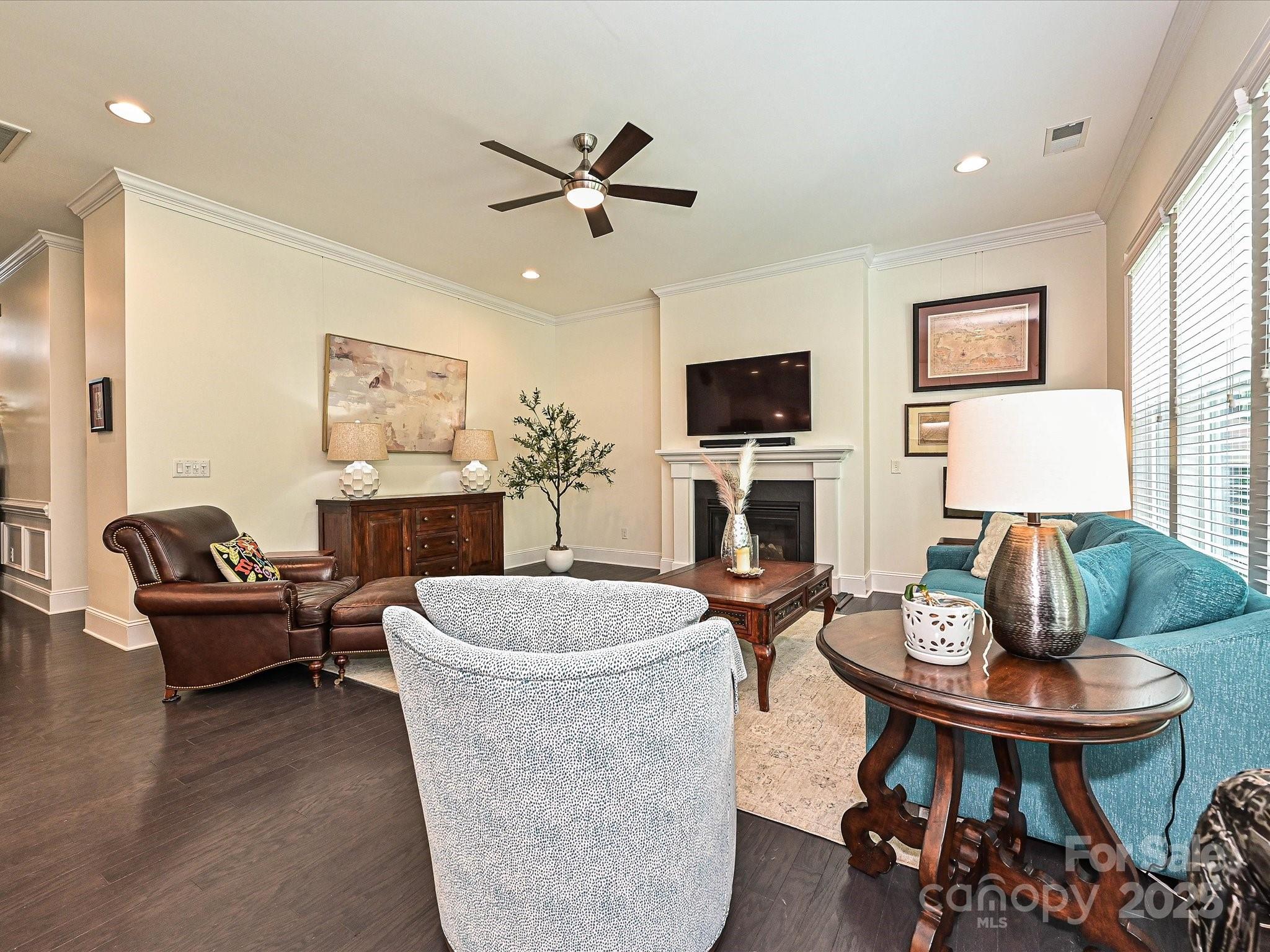 1616 Afton Way Fort Mill, SC 29708 - Photo 12 of 38 a living room with fireplace furniture and a wooden floor