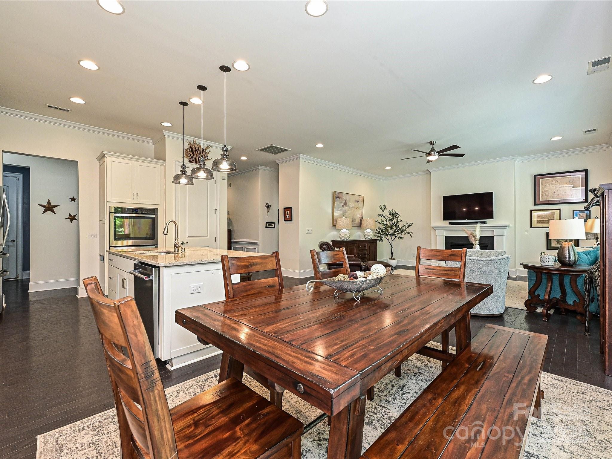 1616 Afton Way Fort Mill, SC 29708 - Photo 15 of 38 a view of a dining room with furniture and wooden floor