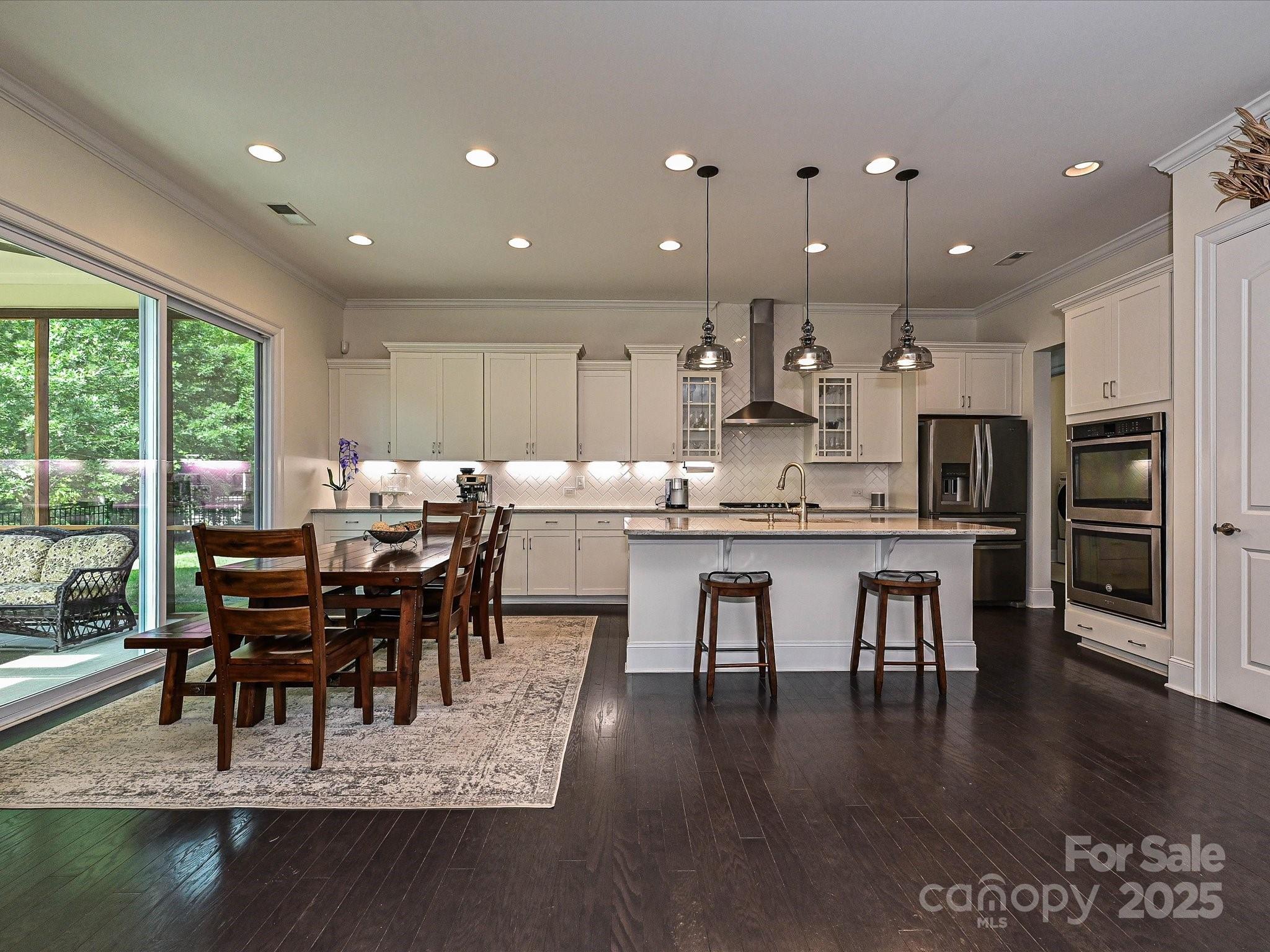 1616 Afton Way Fort Mill, SC 29708 - Photo 16 of 38 a view of a dining room with furniture window and wooden floor