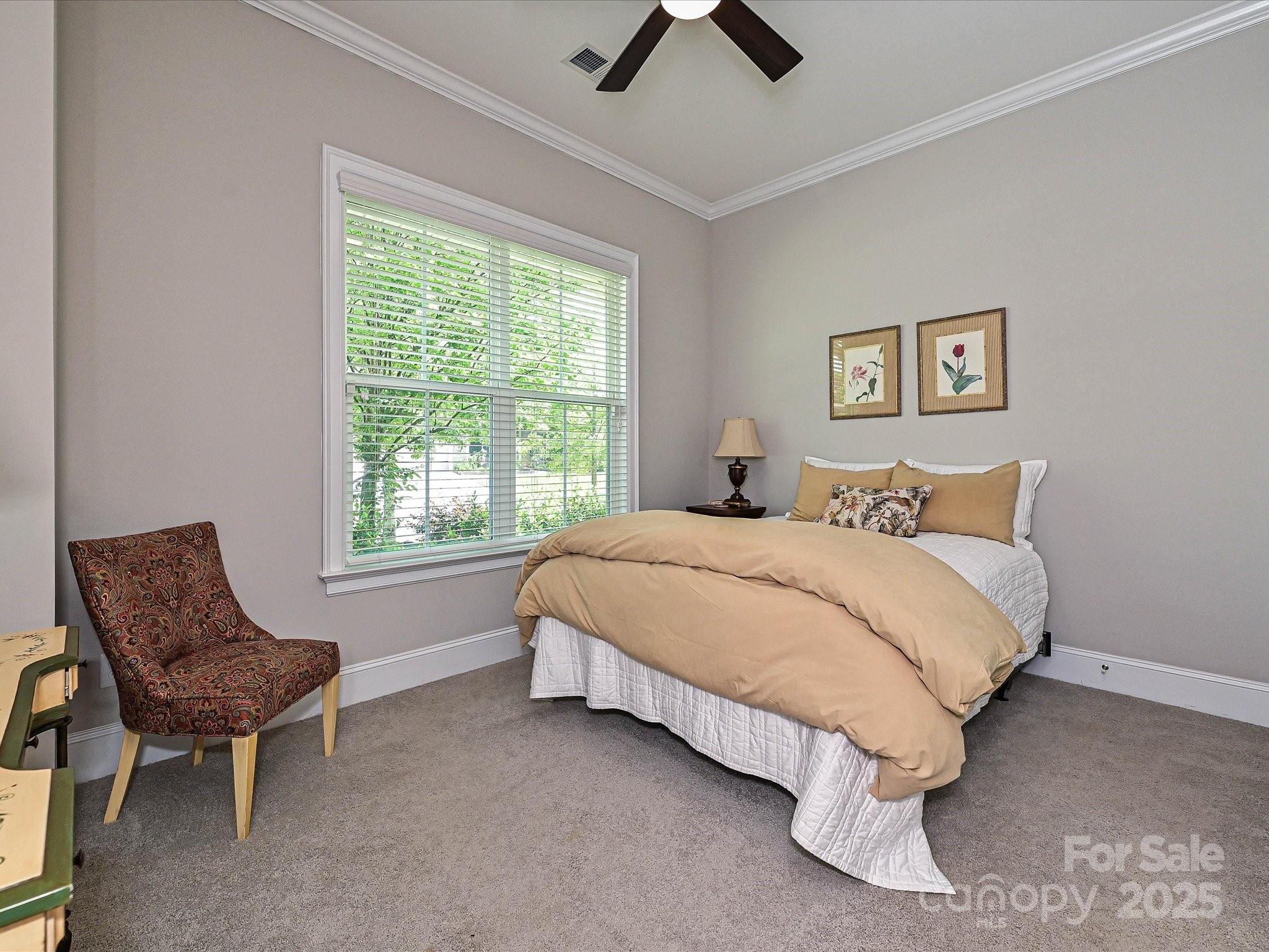 1616 Afton Way Fort Mill, SC 29708 - Photo 24 of 38 a bedroom with a bed and chair