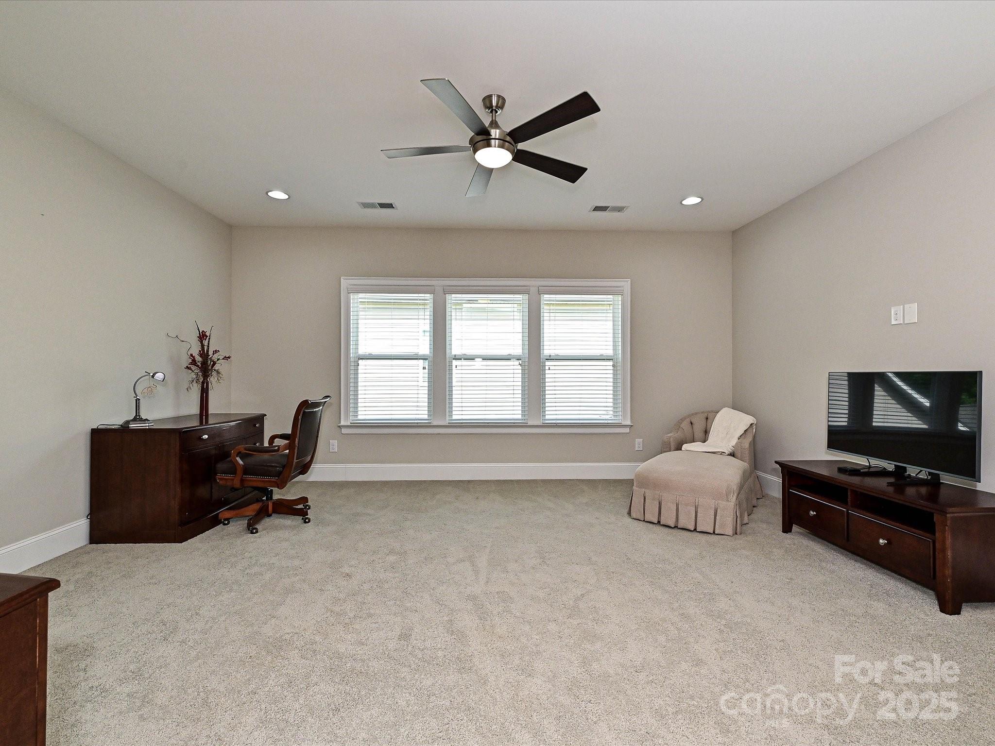 1616 Afton Way Fort Mill, SC 29708 - Photo 29 of 38 a living room with furniture and a ceiling fan