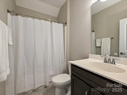 a view of storage and utility room with washer and dryer