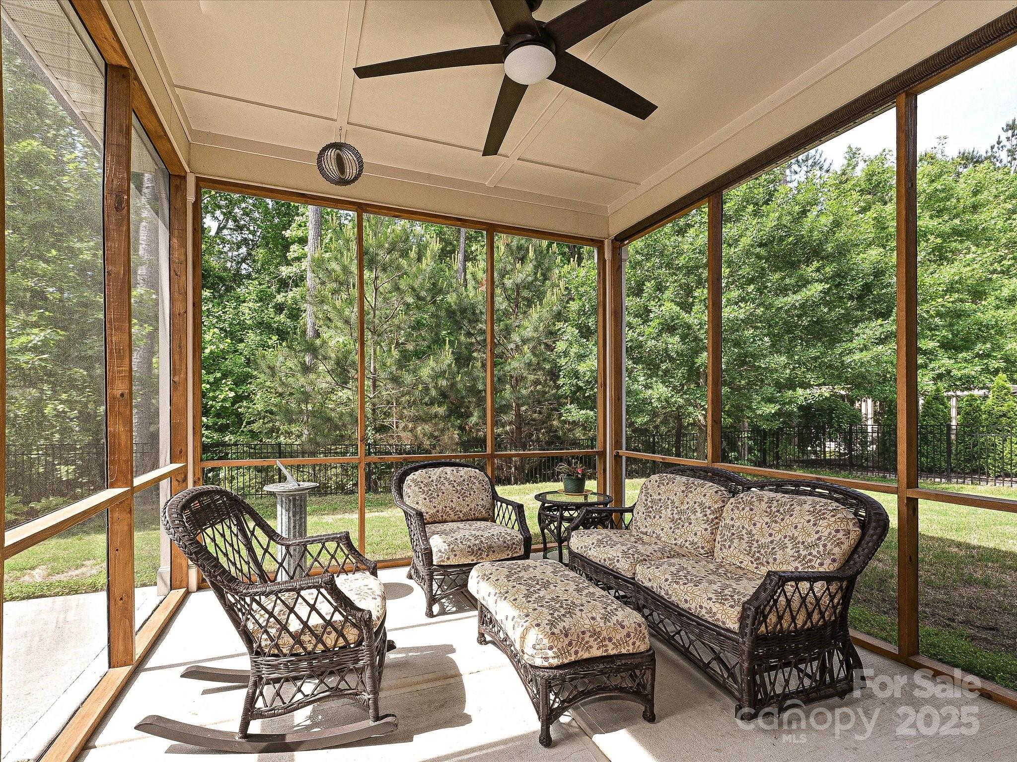 1616 Afton Way Fort Mill, SC 29708 - Photo 32 of 38 a living room with patio furniture and a floor to ceiling window