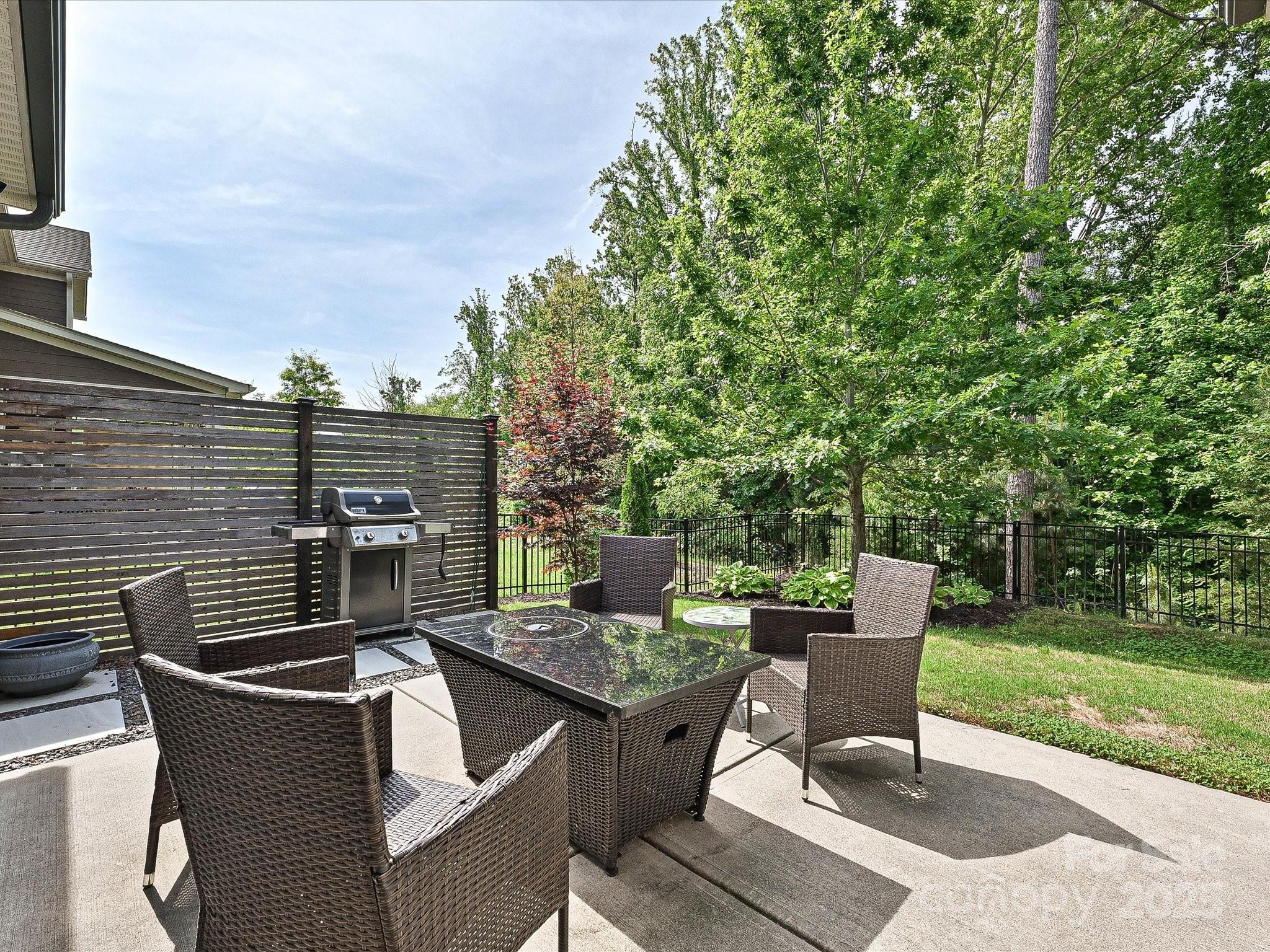 1616 Afton Way Fort Mill, SC 29708 - Photo 33 of 38 a view of backyard with seating area and green space