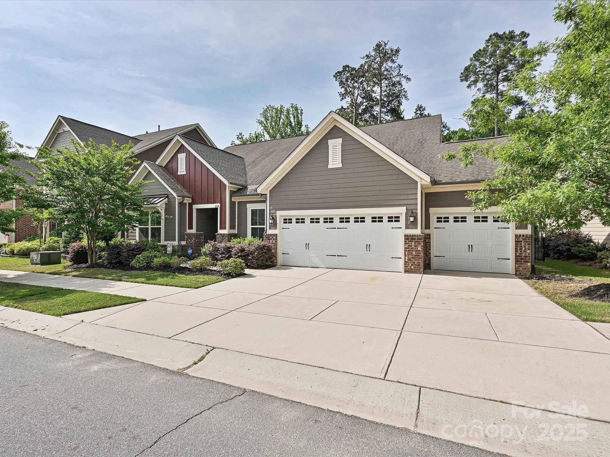 1616 Afton Way Fort Mill, SC 29708 - Photo 37 of 38 a view of a white house with a yard and potted plants