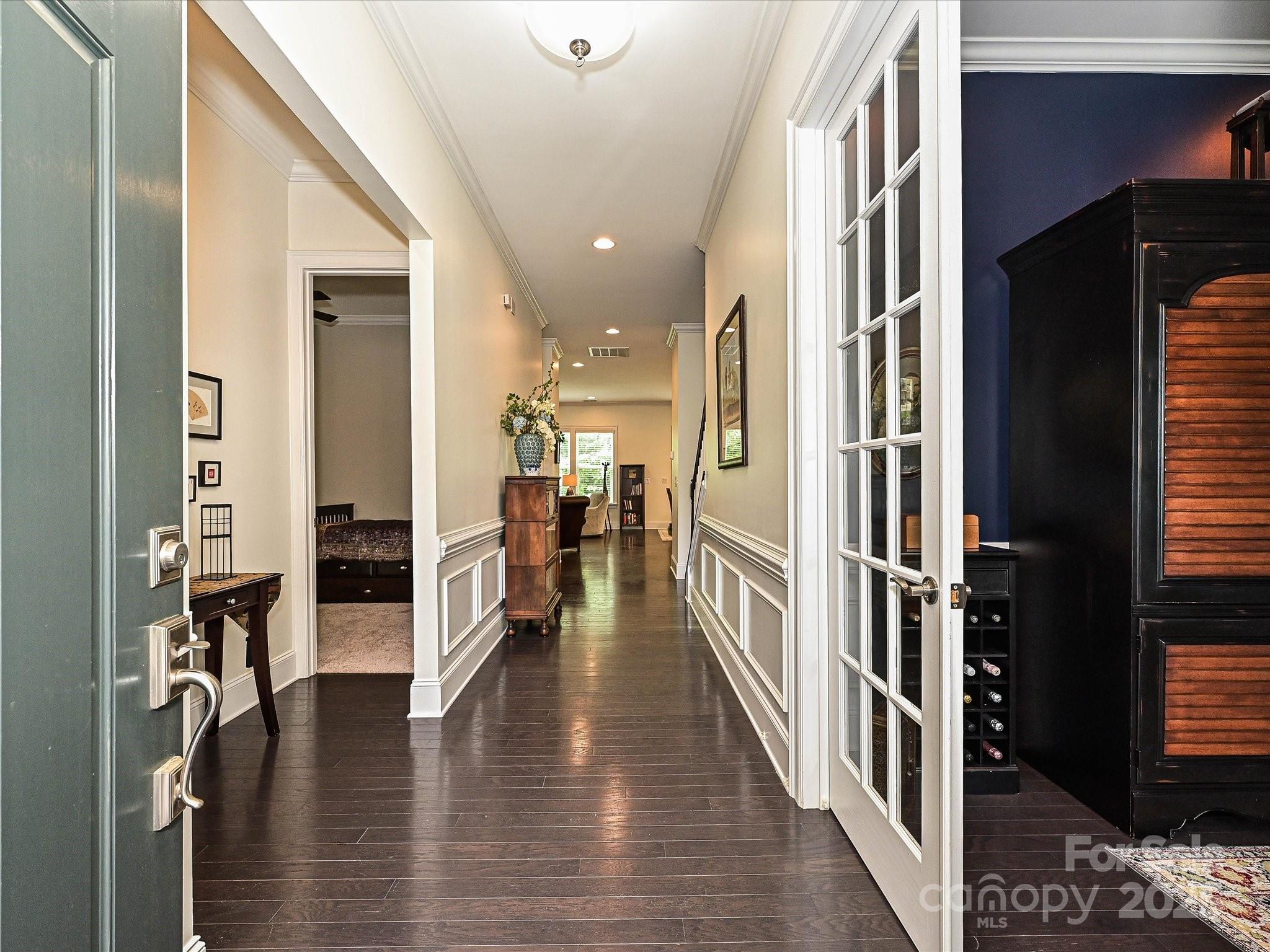 1616 Afton Way Fort Mill, SC 29708 - Photo 5 of 38 a view of a hallway with wooden floor windows and a livingroom