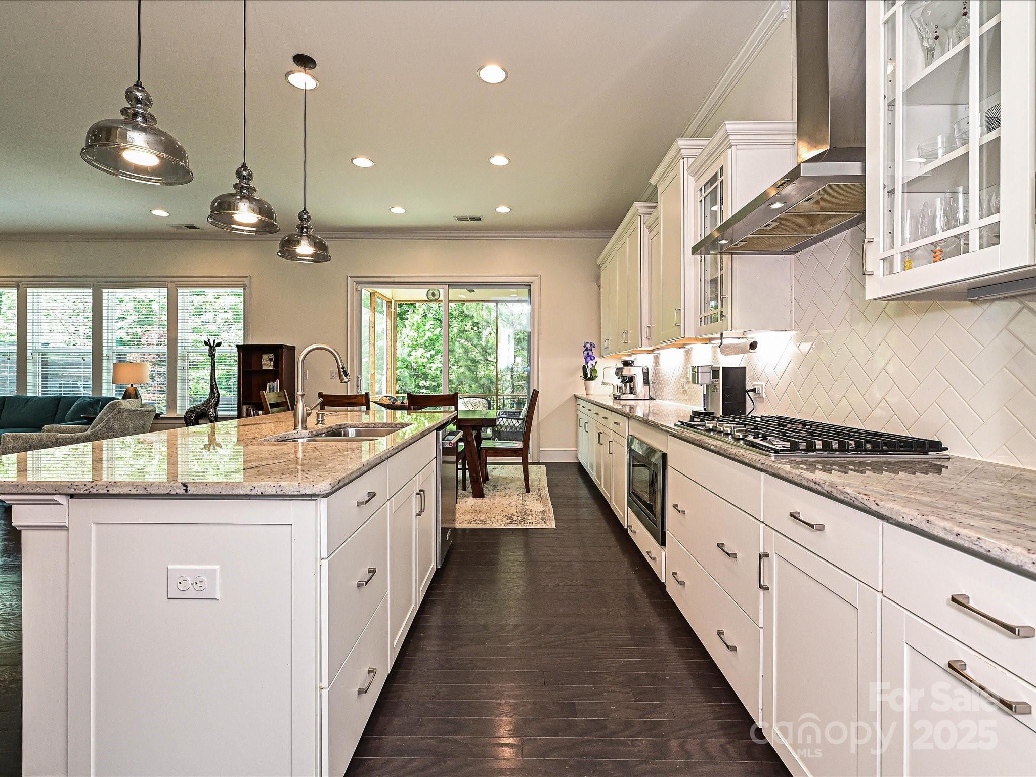 1616 Afton Way Fort Mill, SC 29708 - Photo 10 of 38 a large kitchen with stainless steel appliances a lot of counter space and a wooden floor