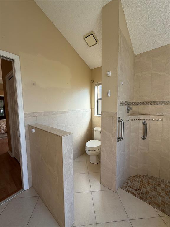 1716 Percheron Drive Trinity, FL 34655 - Photo 20 of 29 a bathroom with a toilet and a shower