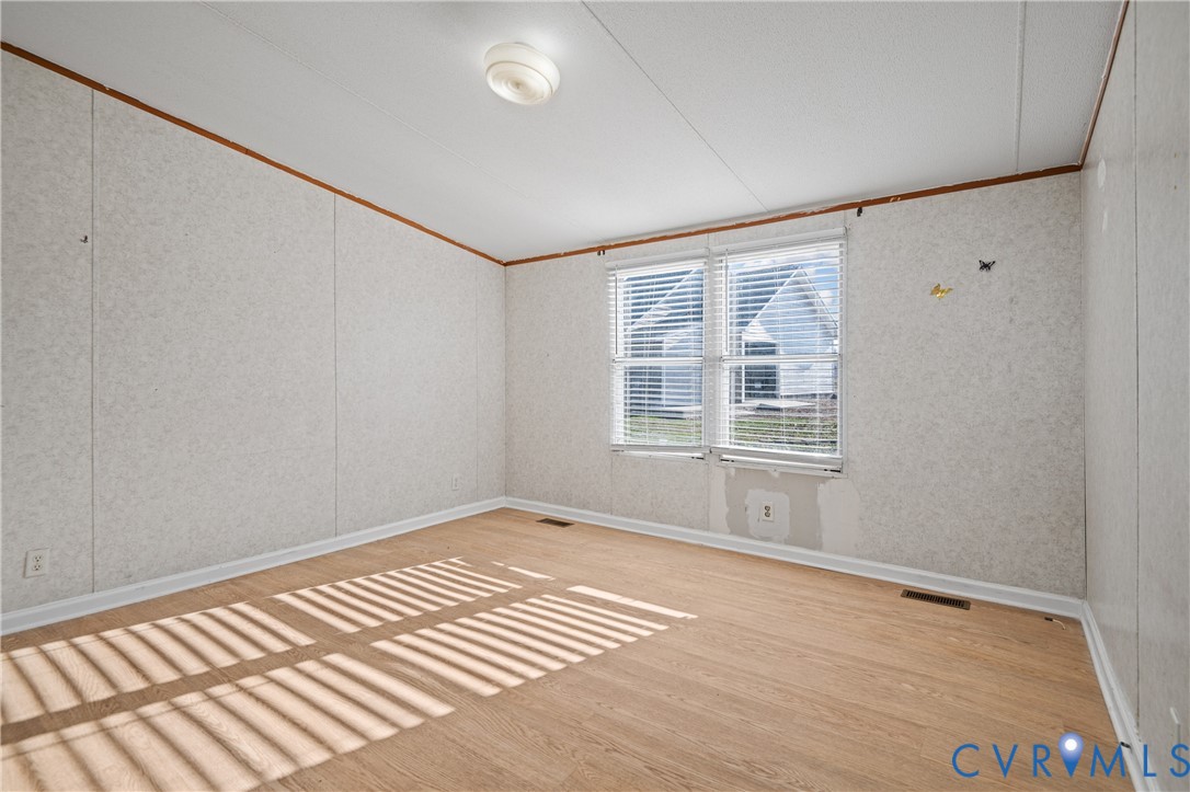 14306 Wilkinson Road Dewitt, VA 23840 - Photo 31 of 60 Wood-finish flooring with a ceiling-mounted light