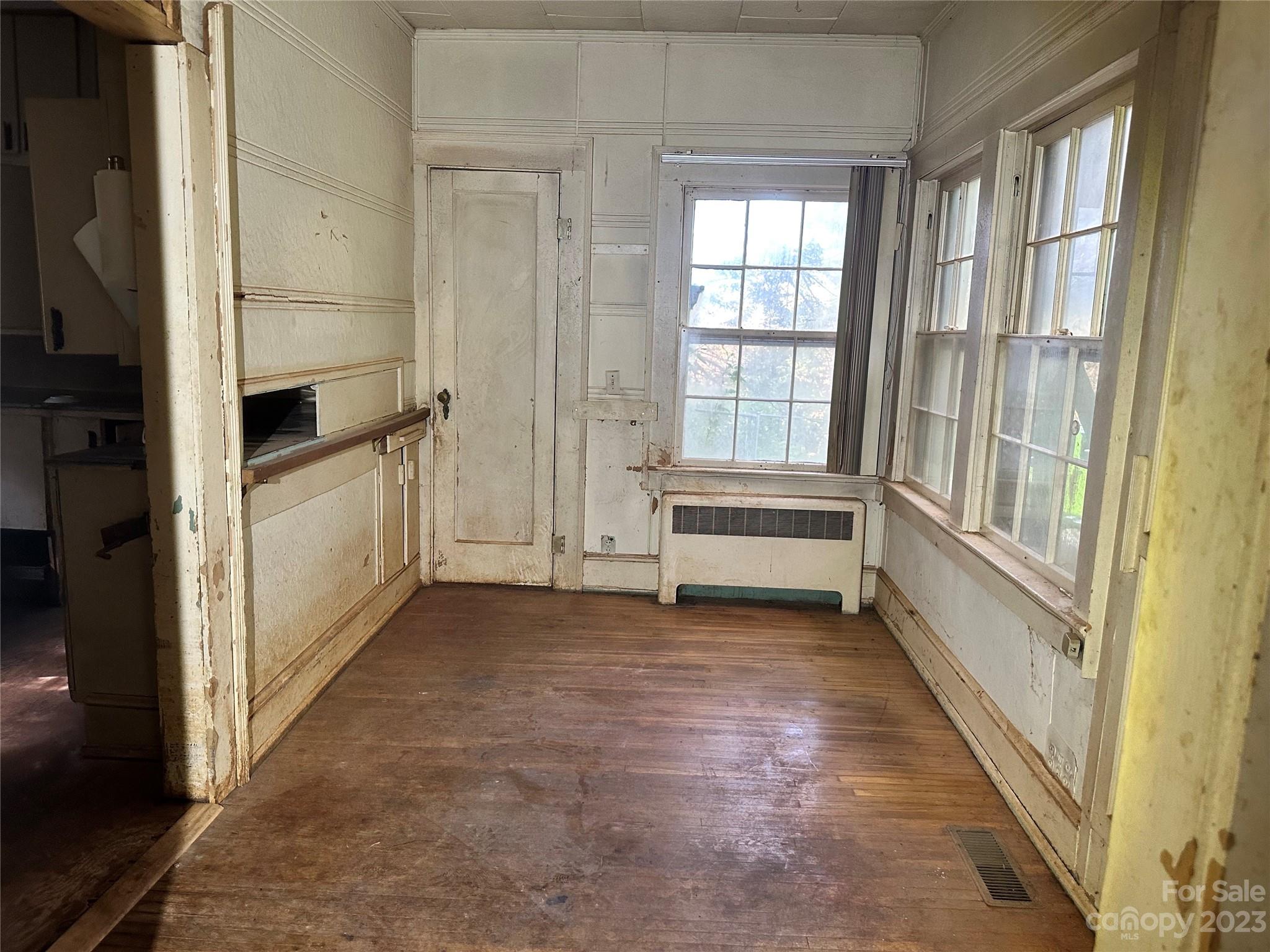 324 Buzzard's Roost Road Cullowhee, NC 28723 - Photo 14 of 18 a view of hallway with stairs and furniture
