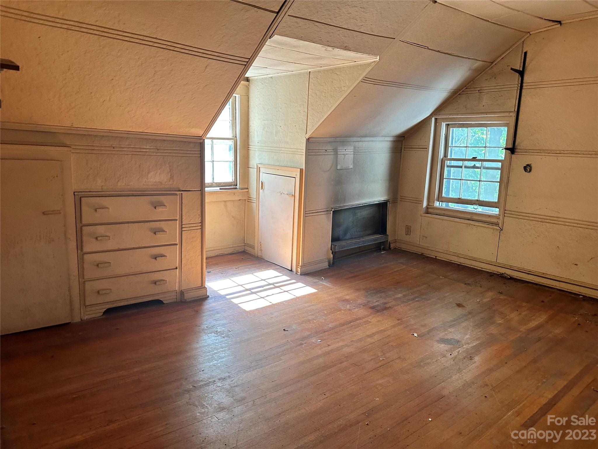 324 Buzzard's Roost Road Cullowhee, NC 28723 - Photo 17 of 18 a view of a room with cabinet and window