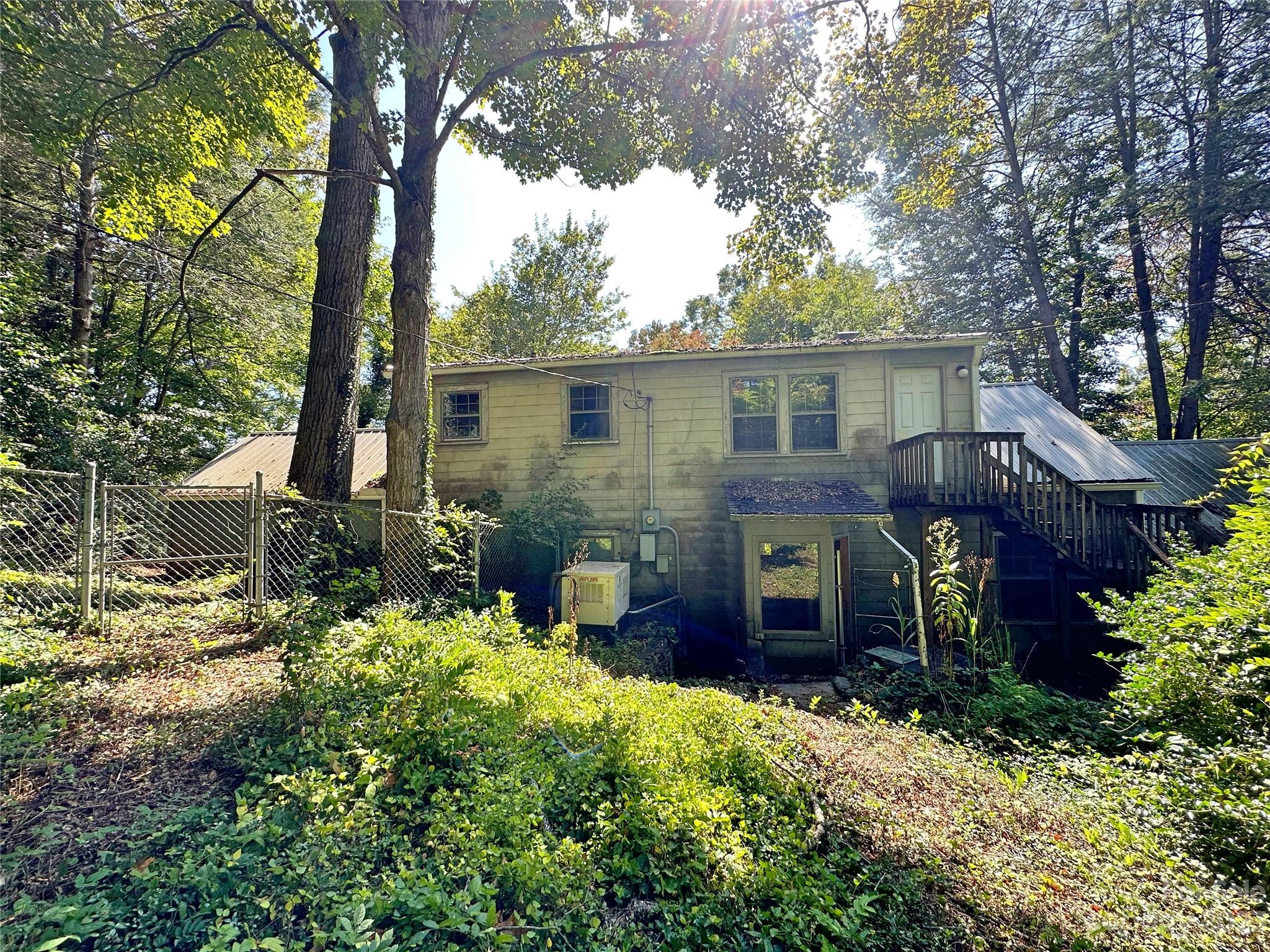 324 Buzzard's Roost Road Cullowhee, NC 28723 - Photo 2 of 18 front view of a house with a yard