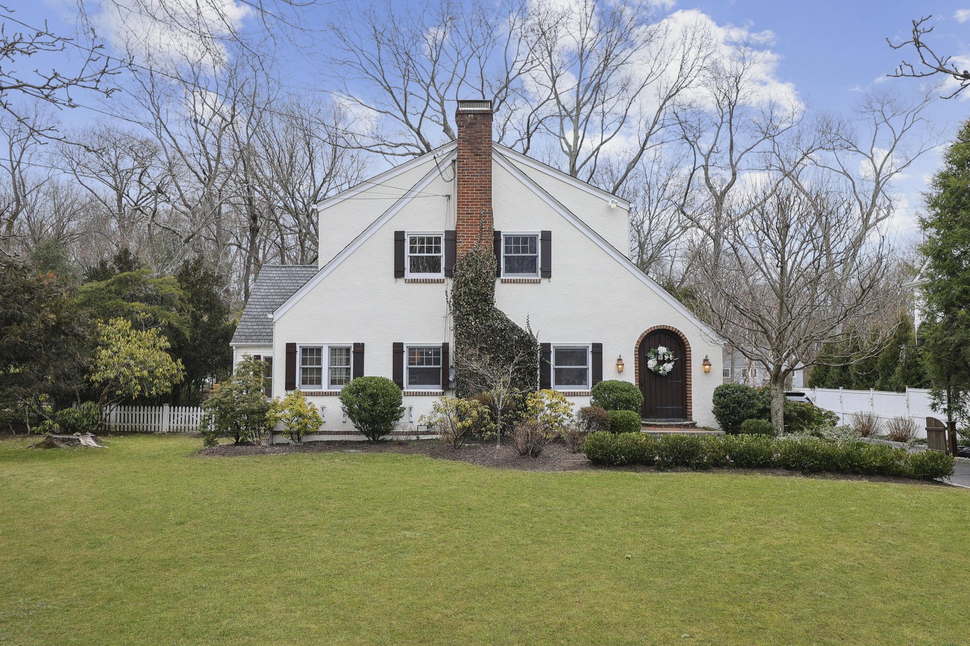 22 Birch Road Darien, CT 06820 - Photo 1 of 40 a front view of house with garden