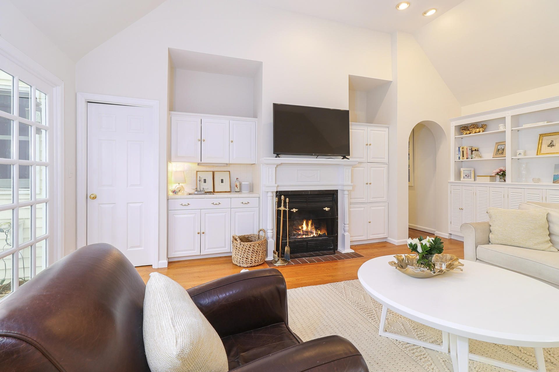 22 Birch Road Darien, CT 06820 - Photo 16 of 40 a living room with furniture and a fireplace