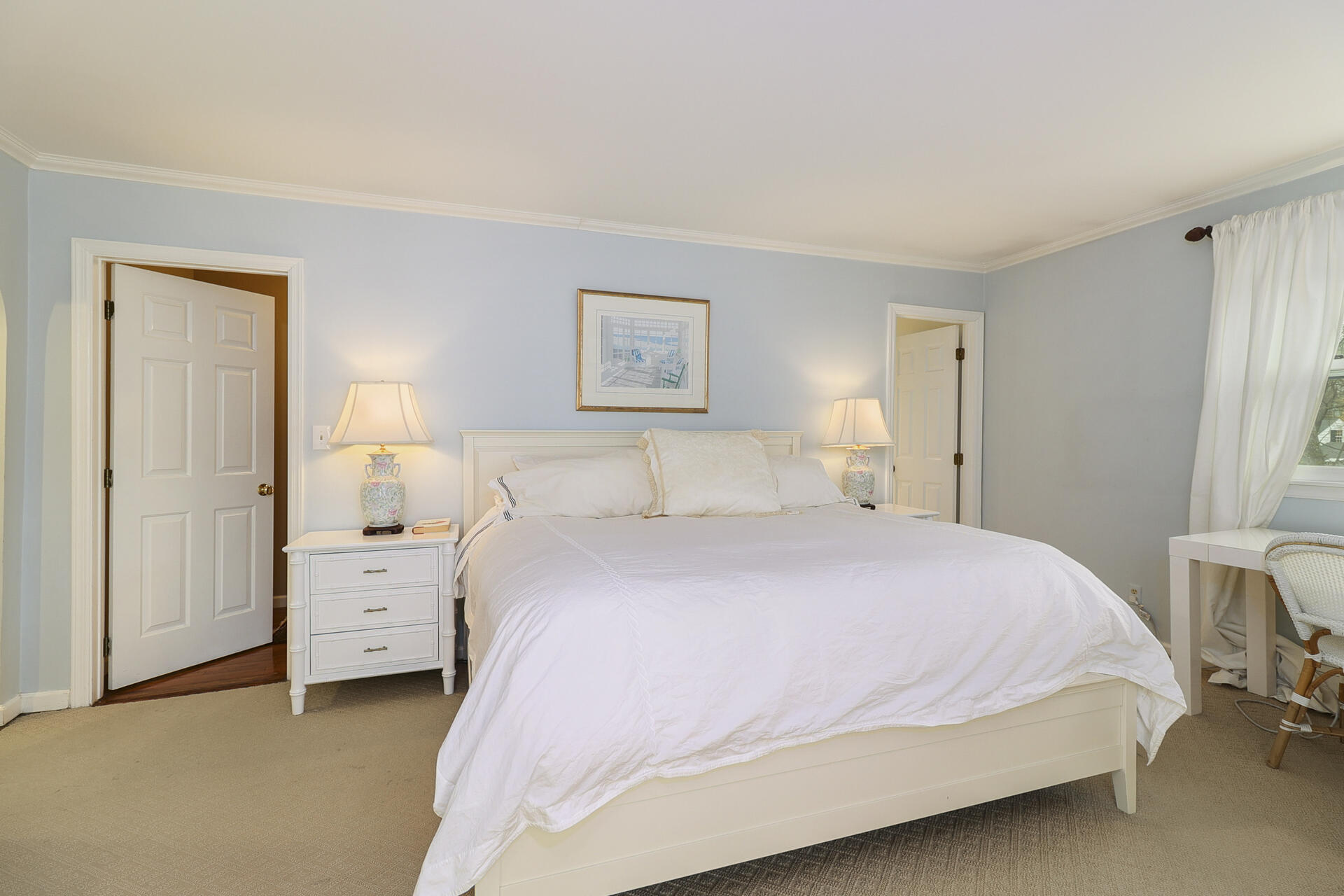 22 Birch Road Darien, CT 06820 - Photo 20 of 40 a bedroom with a bed and a window