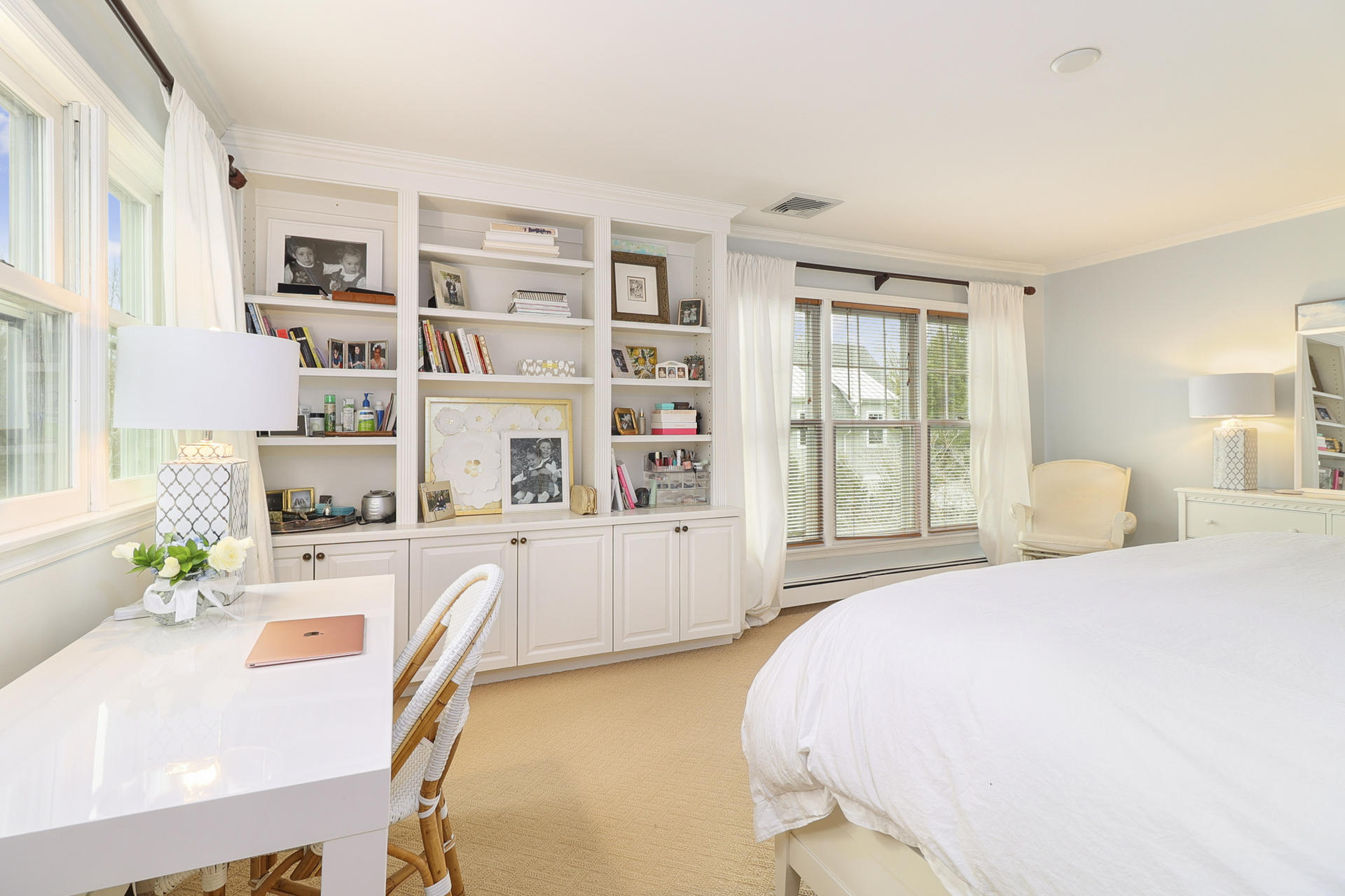 22 Birch Road Darien, CT 06820 - Photo 22 of 40 a bedroom with a bed furniture and a book shelf