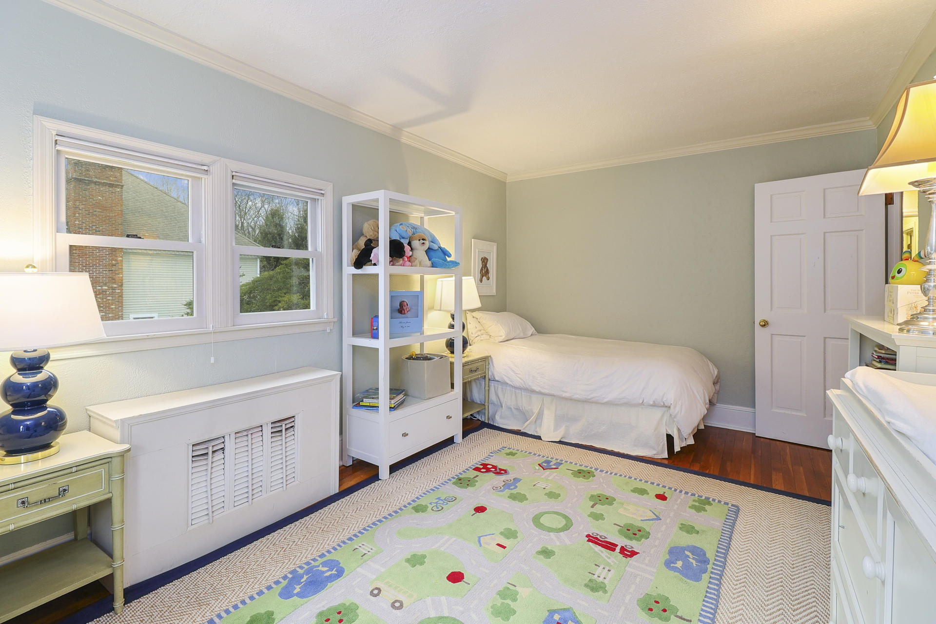 22 Birch Road Darien, CT 06820 - Photo 26 of 40 a bedroom with a bed and a dresser
