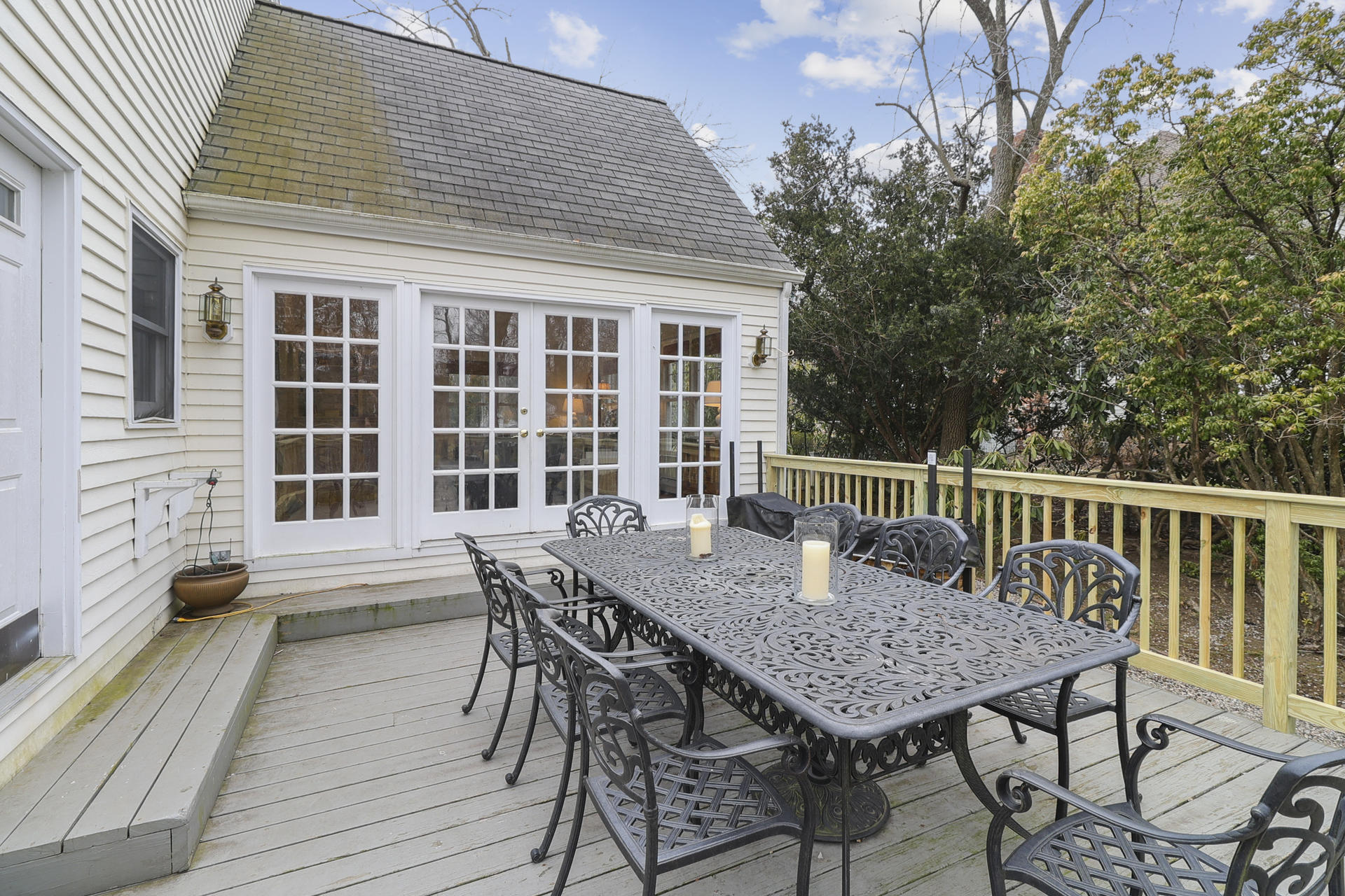 22 Birch Road Darien, CT 06820 - Photo 31 of 40 a view of a dinning table and chairs on the roof deck