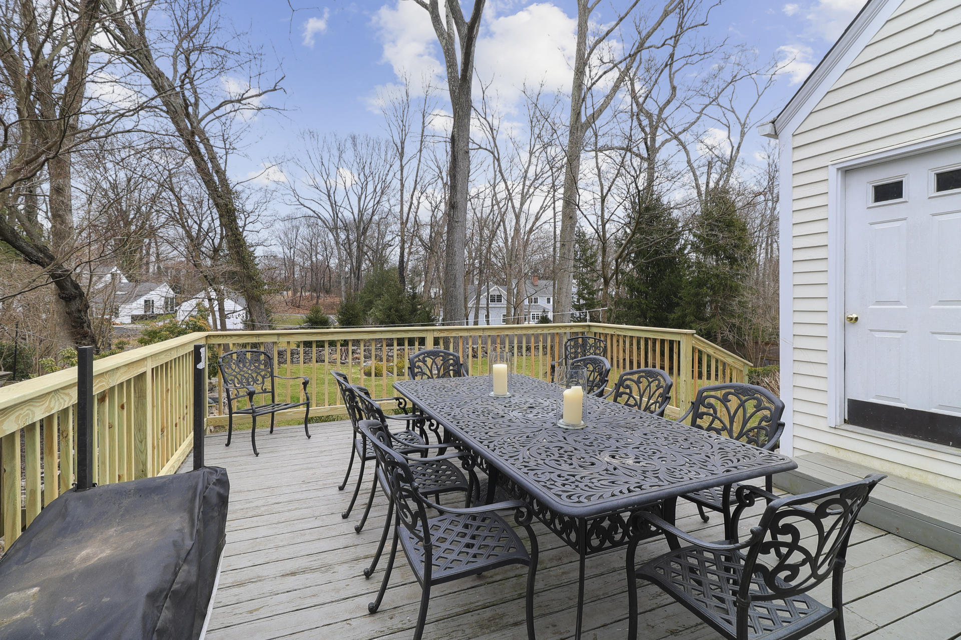 22 Birch Road Darien, CT 06820 - Photo 32 of 40 a deck with trees in front of it