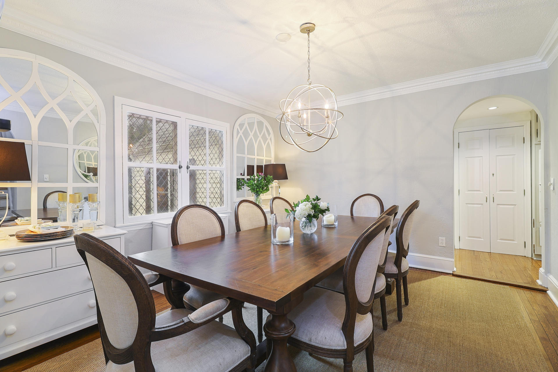 22 Birch Road Darien, CT 06820 - Photo 8 of 40 a view of a dining room with furniture a chandelier and wooden floor