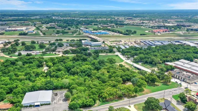 an aerial view of residential building and lake view