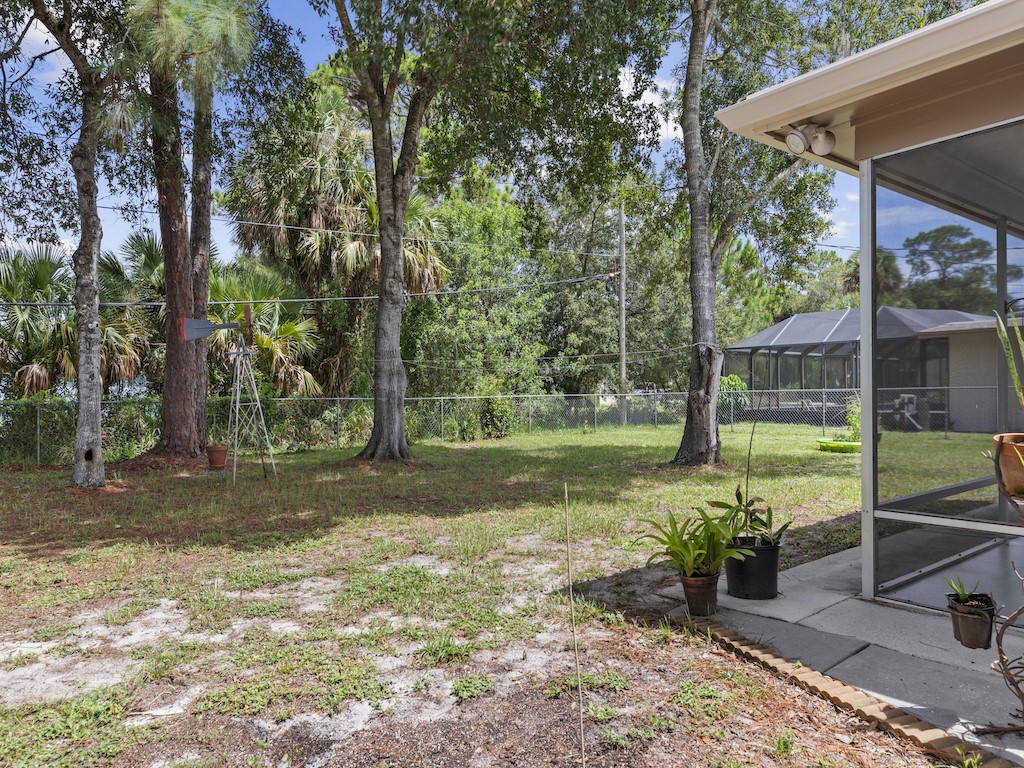 7304 Arthurs Road Fort Pierce, FL 34951 - Photo 24 of 29 a view of a backyard with a garden