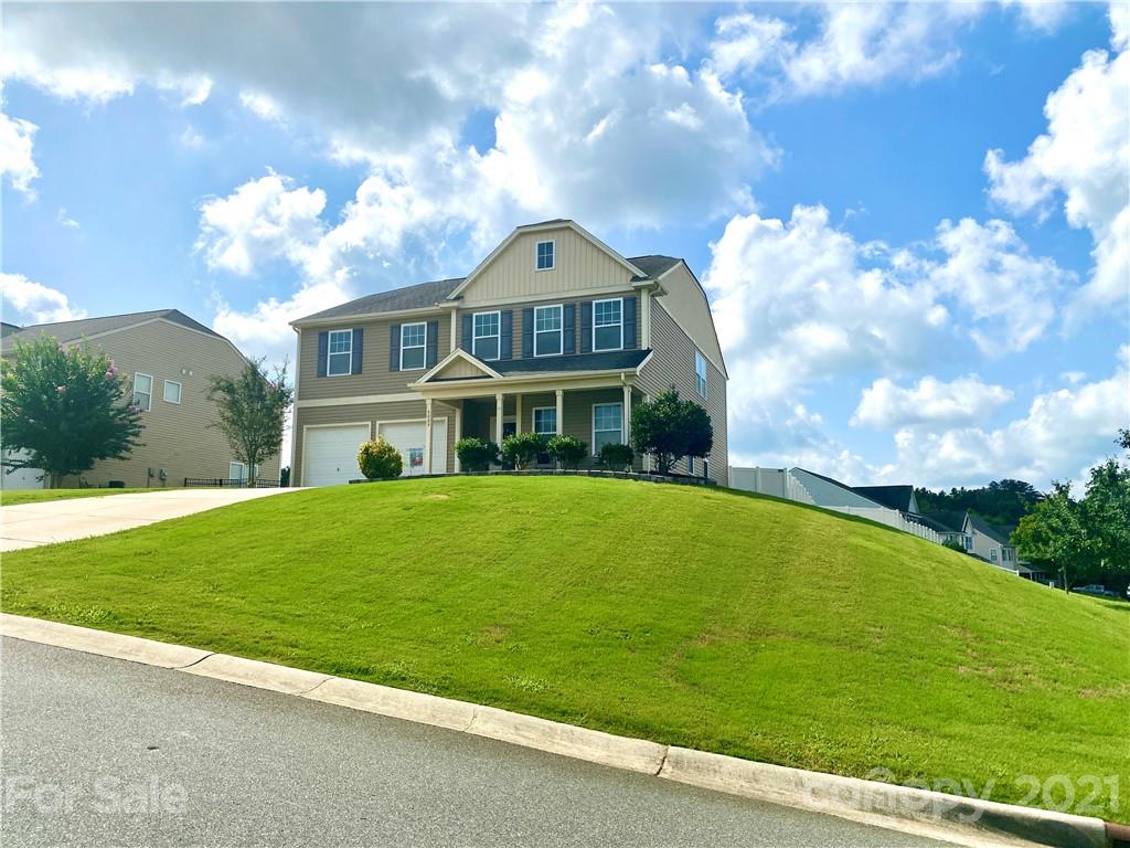 8009 Bryson Road Indian Land, SC 29707 - Photo 1 of 45 a house with garden in front of it