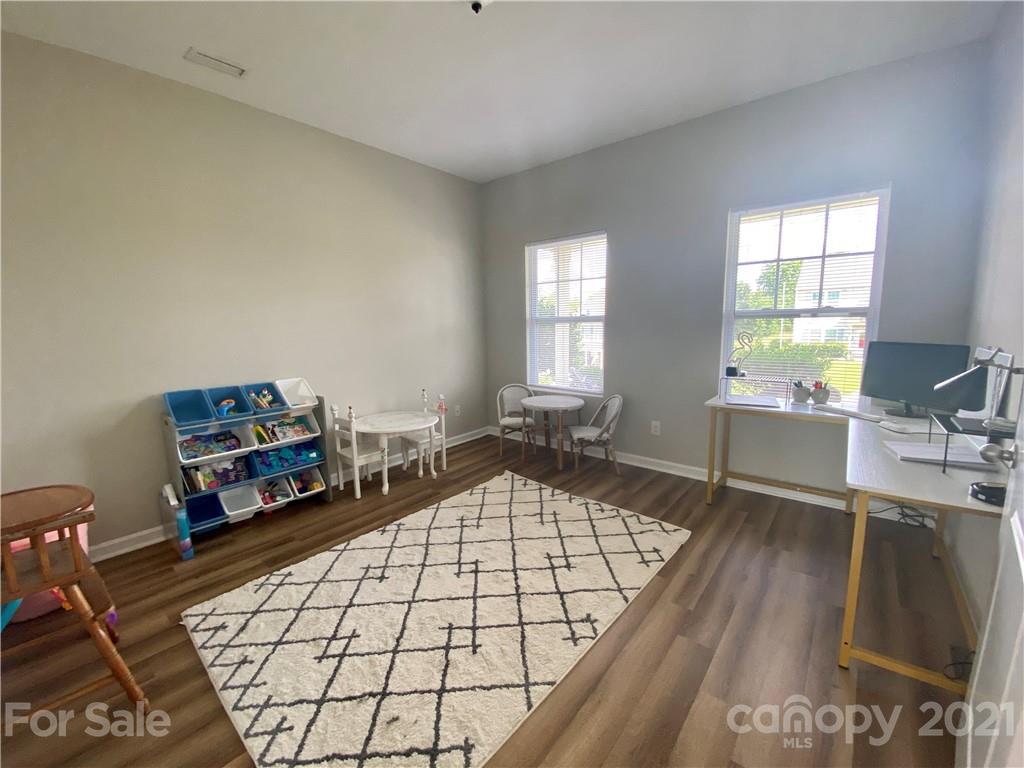 8009 Bryson Road Indian Land, SC 29707 - Photo 24 of 45 a living room with furniture window and a table