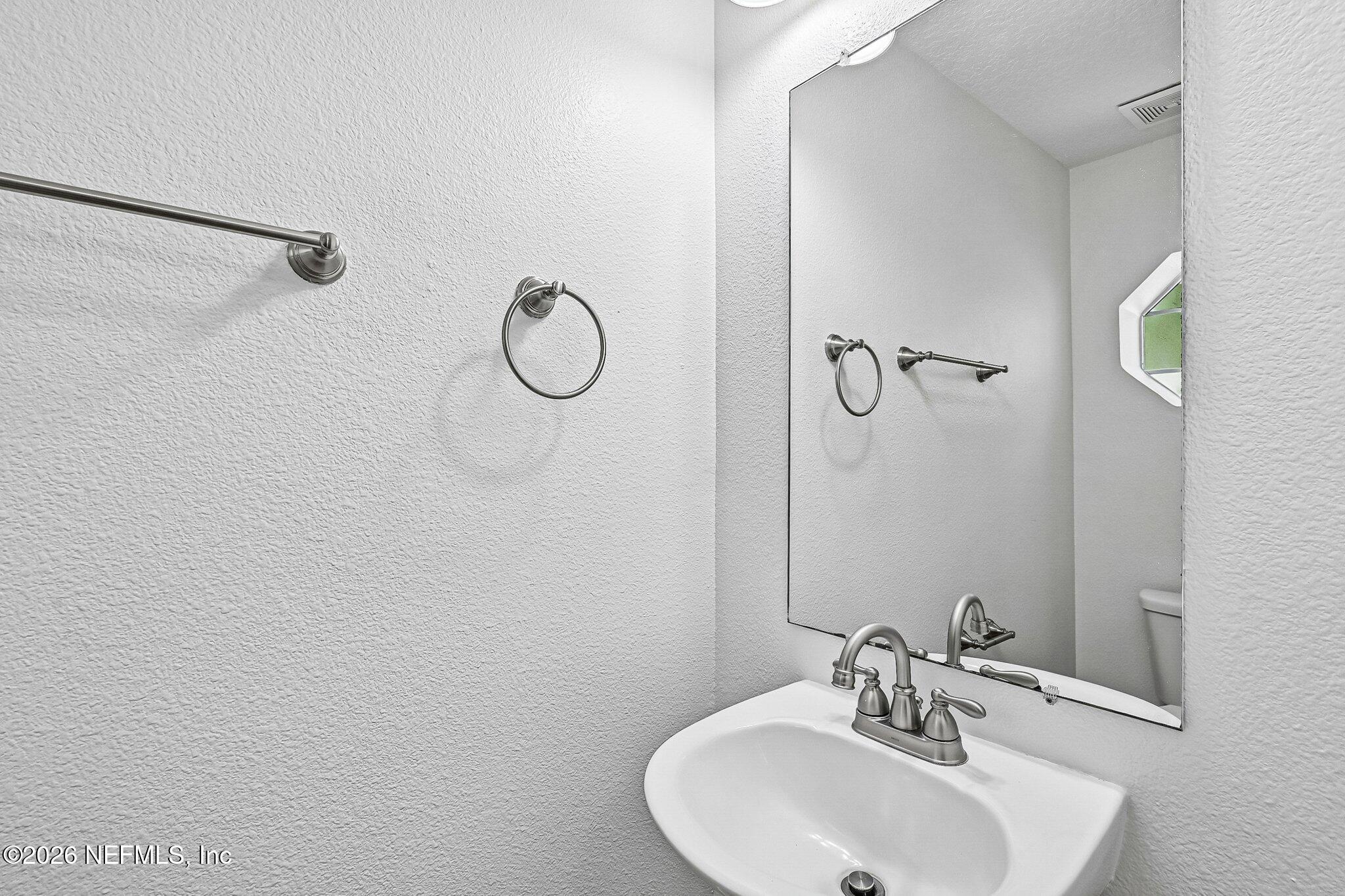 10543 Autumn Trace Road Jacksonville, FL 32257 - Photo 19 of 45 Downstairs Half Bathroom