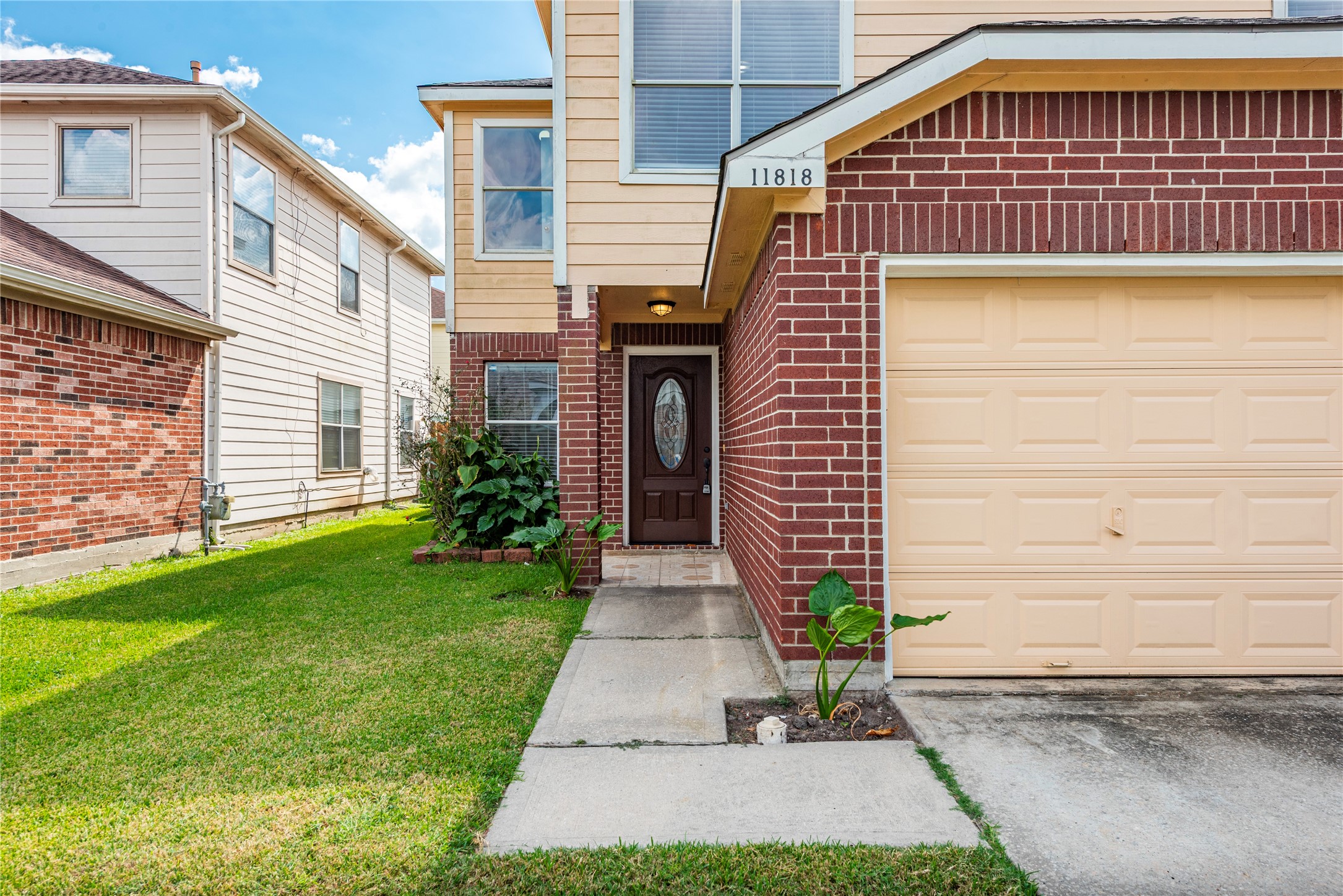 a front view of a house with garden