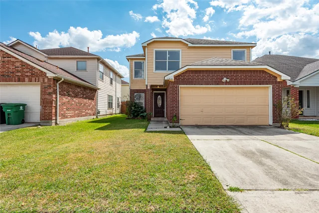 a front view of house with yard