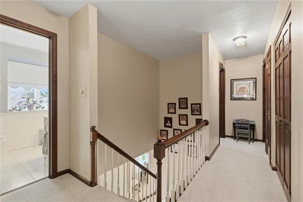 a view of a hallway with workspace