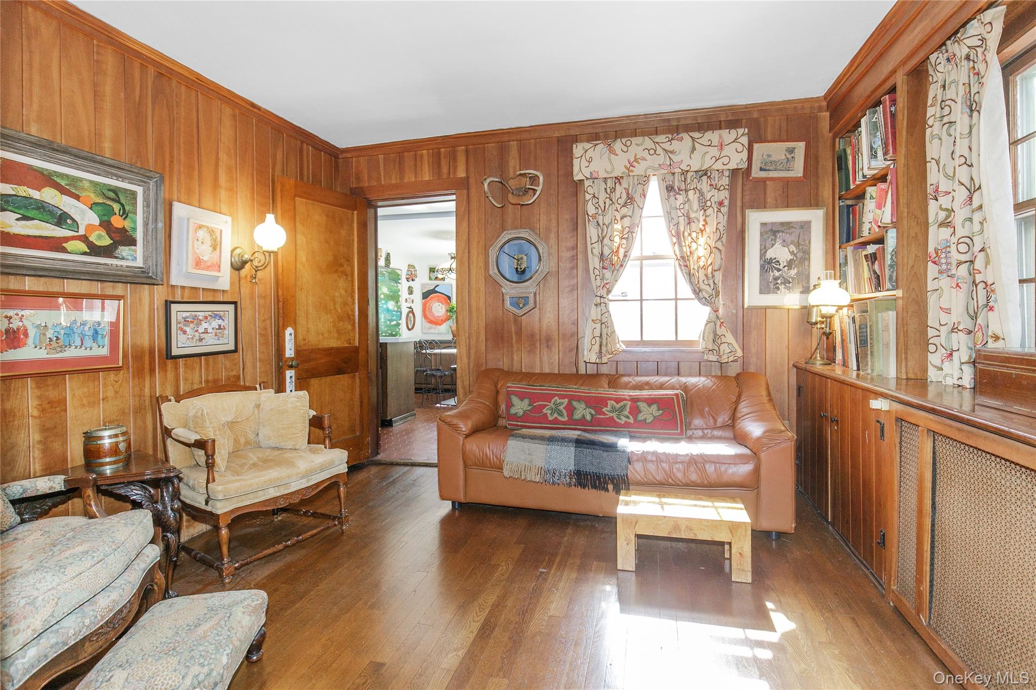 26 Vista Hill Road Great Neck, NY 11021 - Photo 11 of 35 a living room with furniture and a large window