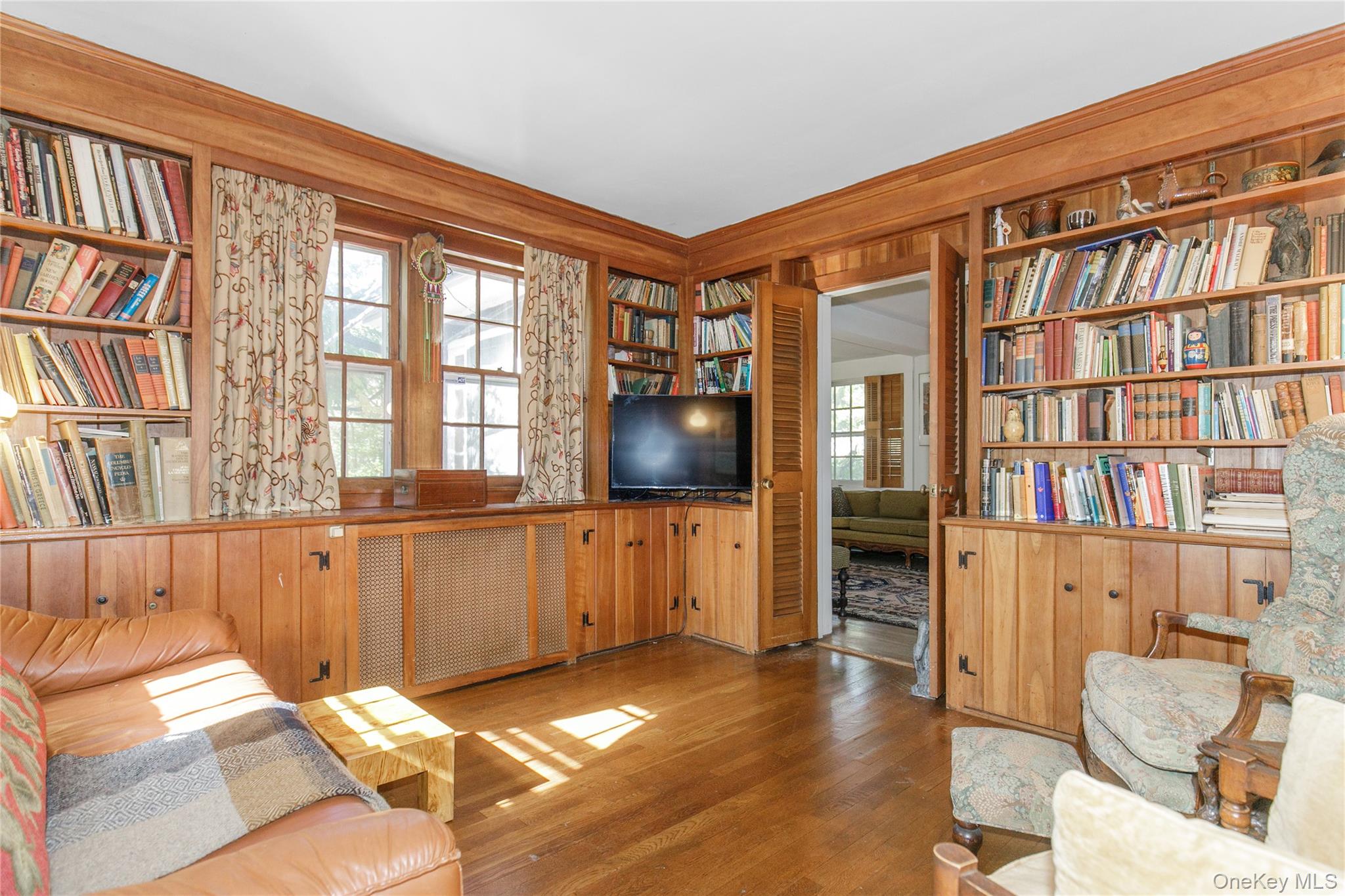 26 Vista Hill Road Great Neck, NY 11021 - Photo 12 of 35 a view of livingroom with furniture and floor to ceiling window
