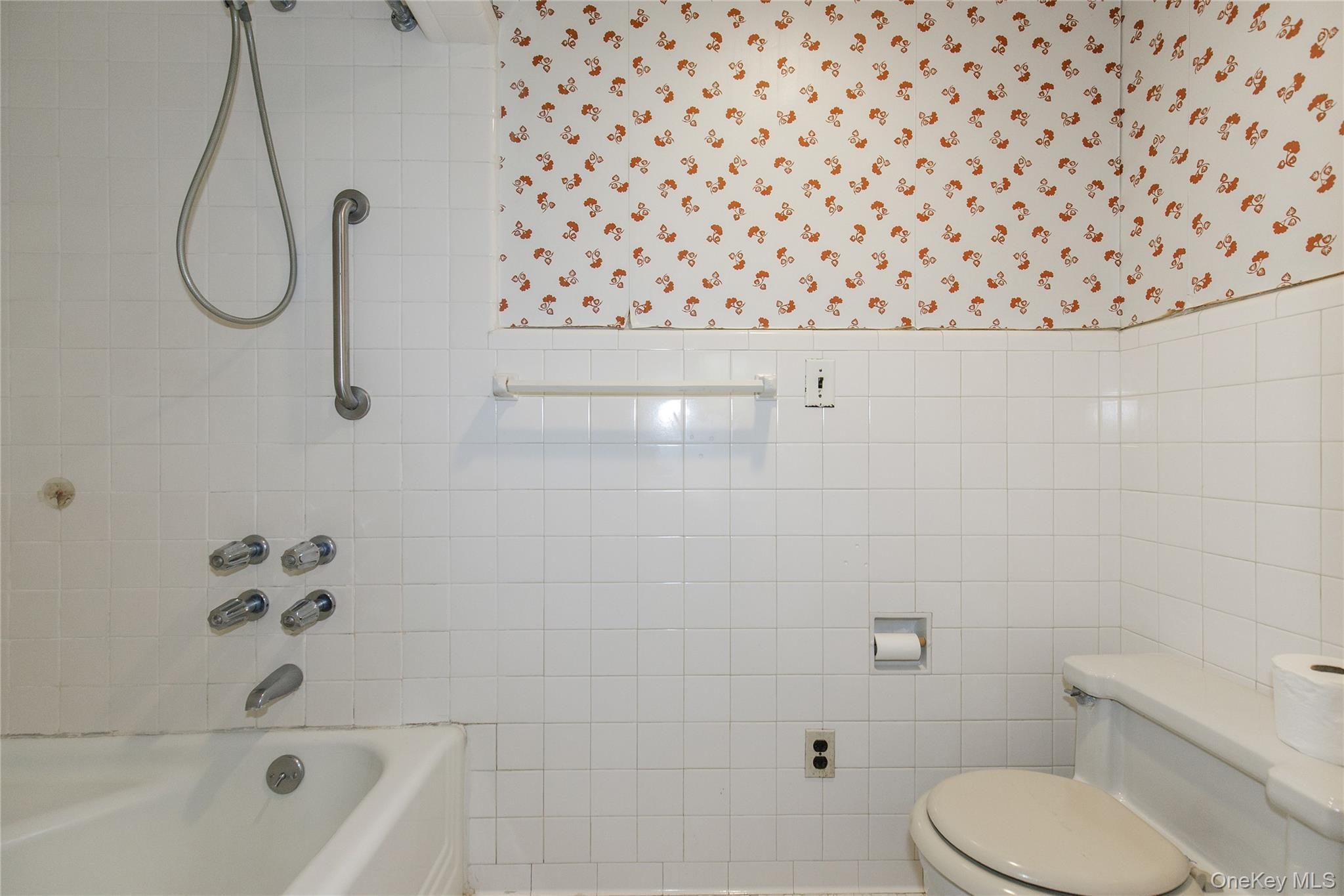 26 Vista Hill Road Great Neck, NY 11021 - Photo 21 of 35 a bathroom with a toilet and a shower