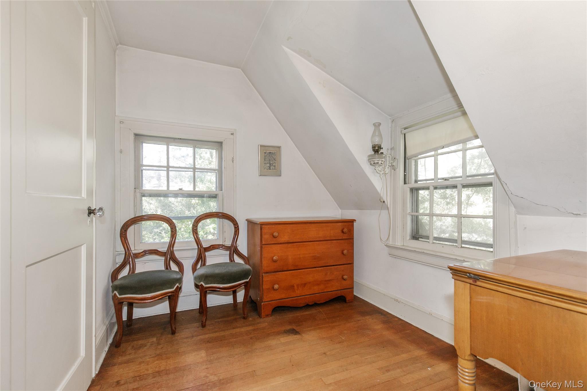 26 Vista Hill Road Great Neck, NY 11021 - Photo 24 of 35 a view of a livingroom with furniture and window