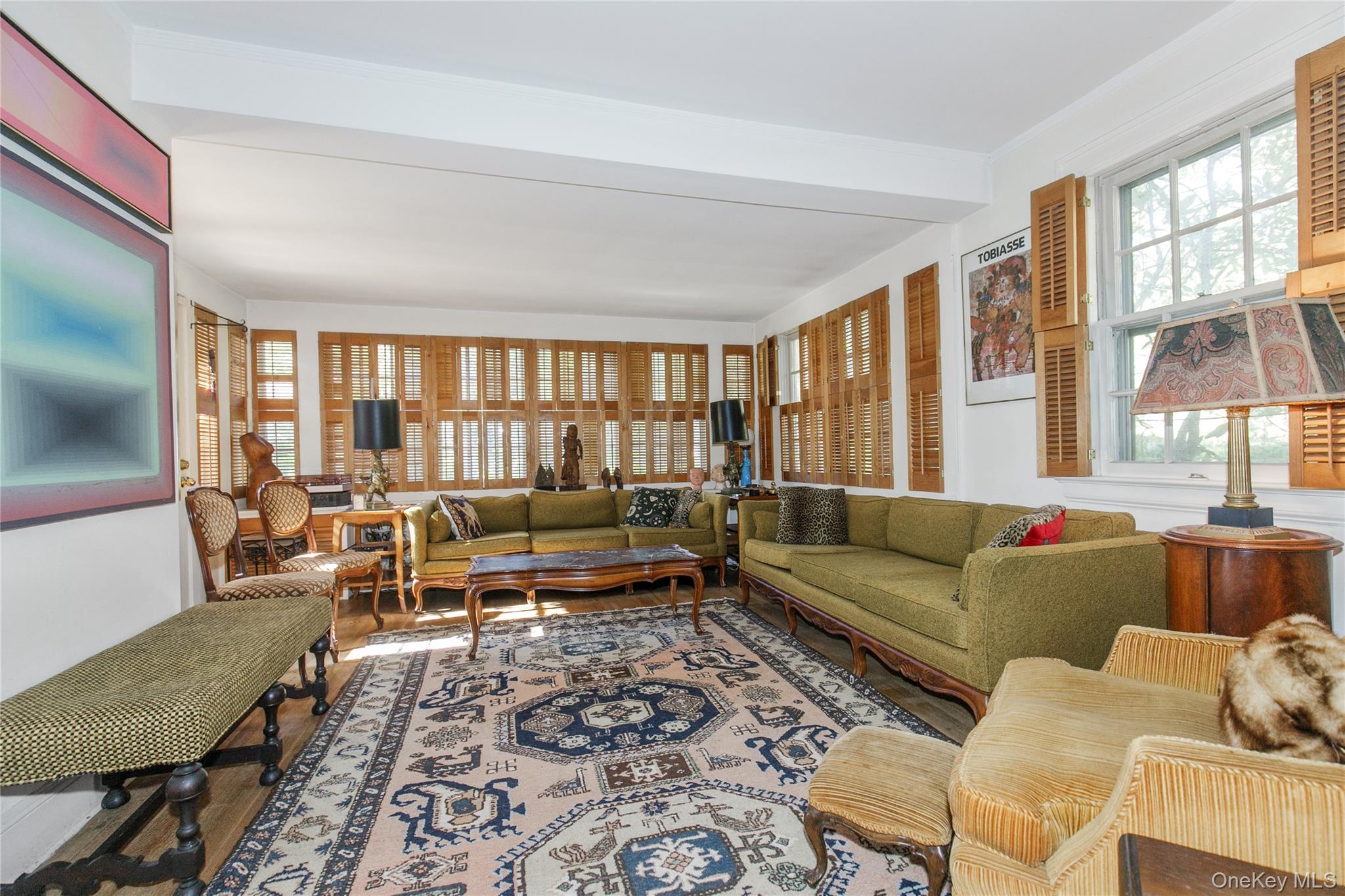 26 Vista Hill Road Great Neck, NY 11021 - Photo 8 of 35 a living room with furniture and a large window