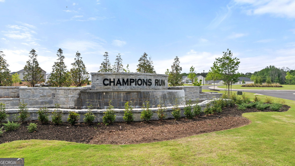 8578 Seabiscuit Road Lithonia, GA 30058 - Photo 2 of 4 a view of a street with a building in the background